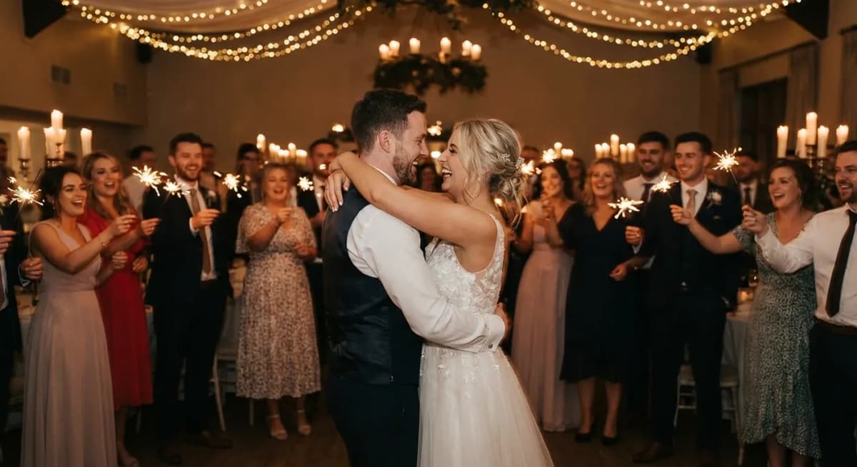 First dance at a wedding reception as the dance floor opens and guests gather around